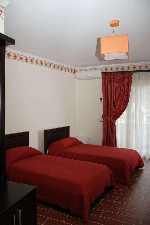 Hotel Leonardo Shkallnur Quarto foto